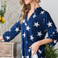 Heimish Full Size Roll-Tab Sleeve Star Print Top