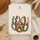 Multi Pattern Horseshoe Tee.