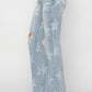 RISEN Mid Rise Button Fly Start Print Flare Jeans